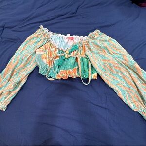 Crop top. In good use. Worn during pregnancy. Smoke/animal free. From Brazil.